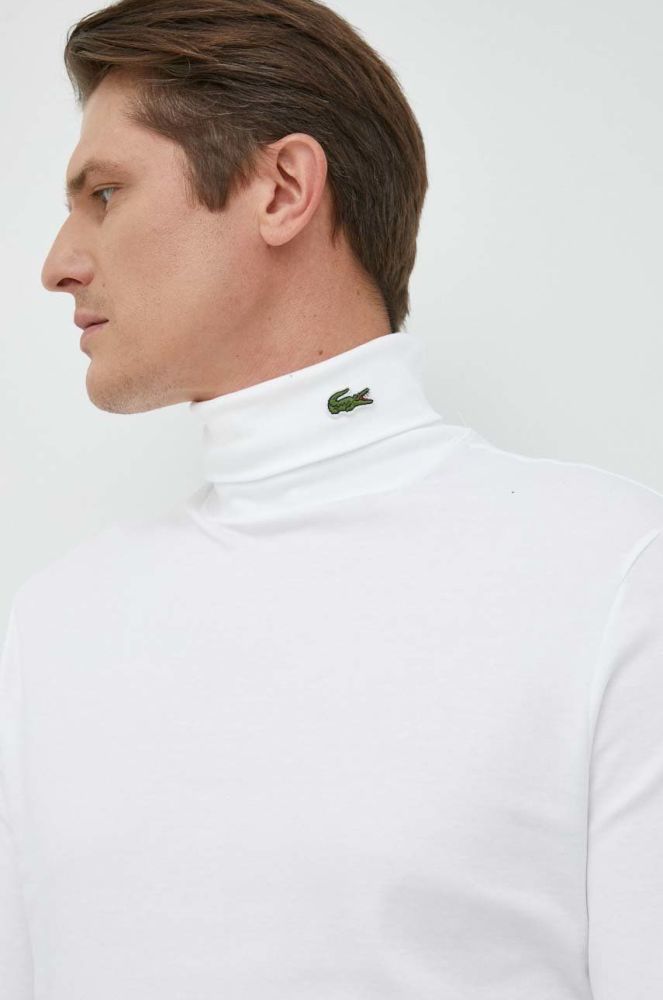 Бавовняний лонгслів Lacoste колір білий однотонний