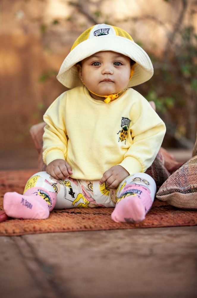 Дитяча бавовняна кофта Mini Rodini колір жовтий візерунок